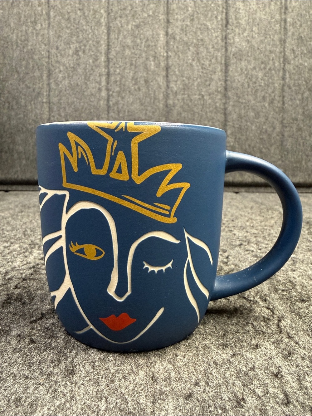 Starbucks Blue Ceramic Mug with Gold Crown and White Face Art